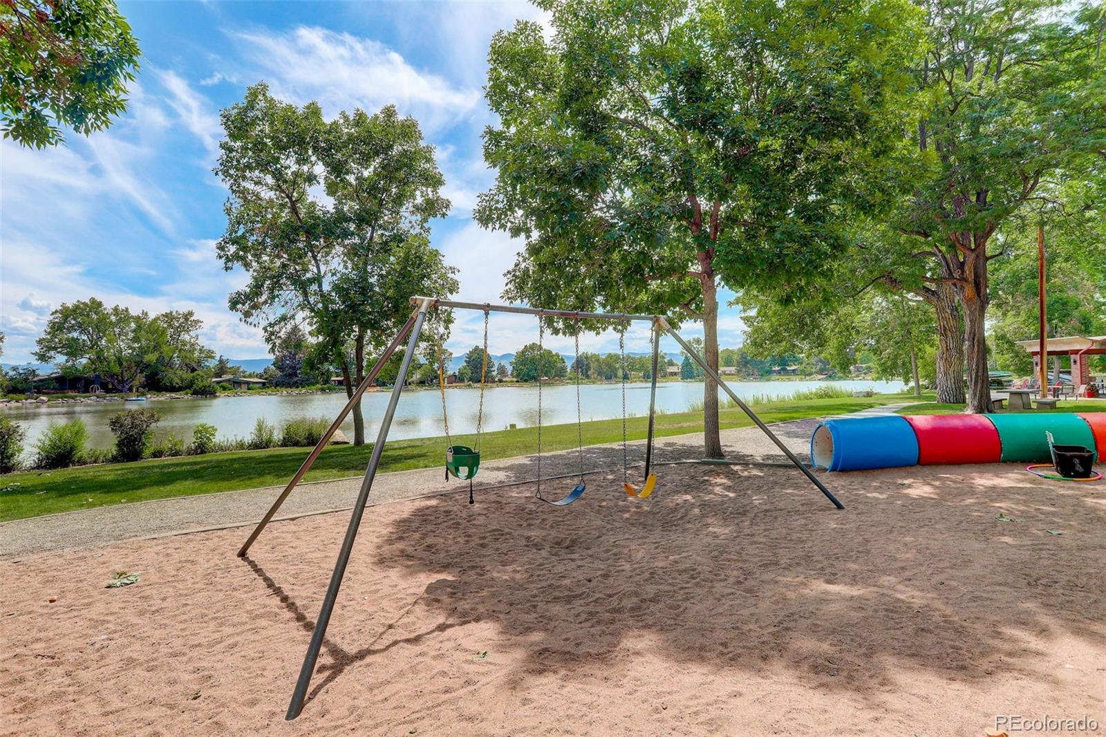 4595 West Lakeridge Road Denver, CO 80219 - Photo 49 of 50 a view of a park with swings