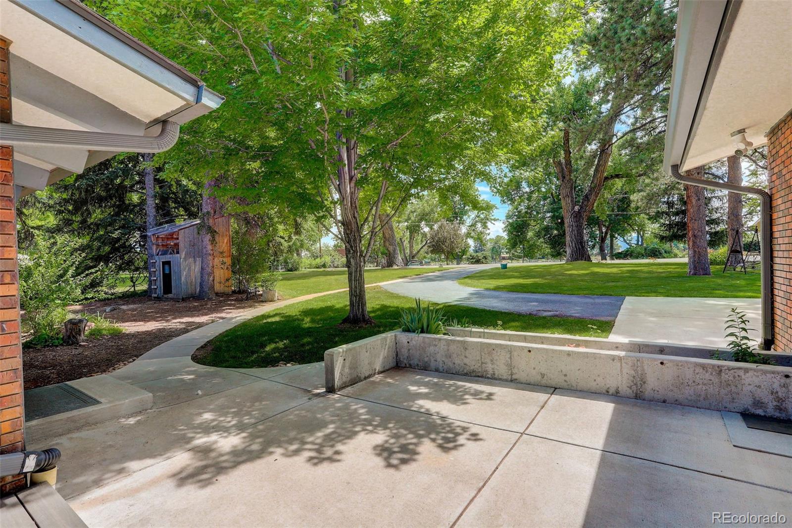 4595 West Lakeridge Road Denver, CO 80219 - Photo 10 of 50 a view of a park with tree s