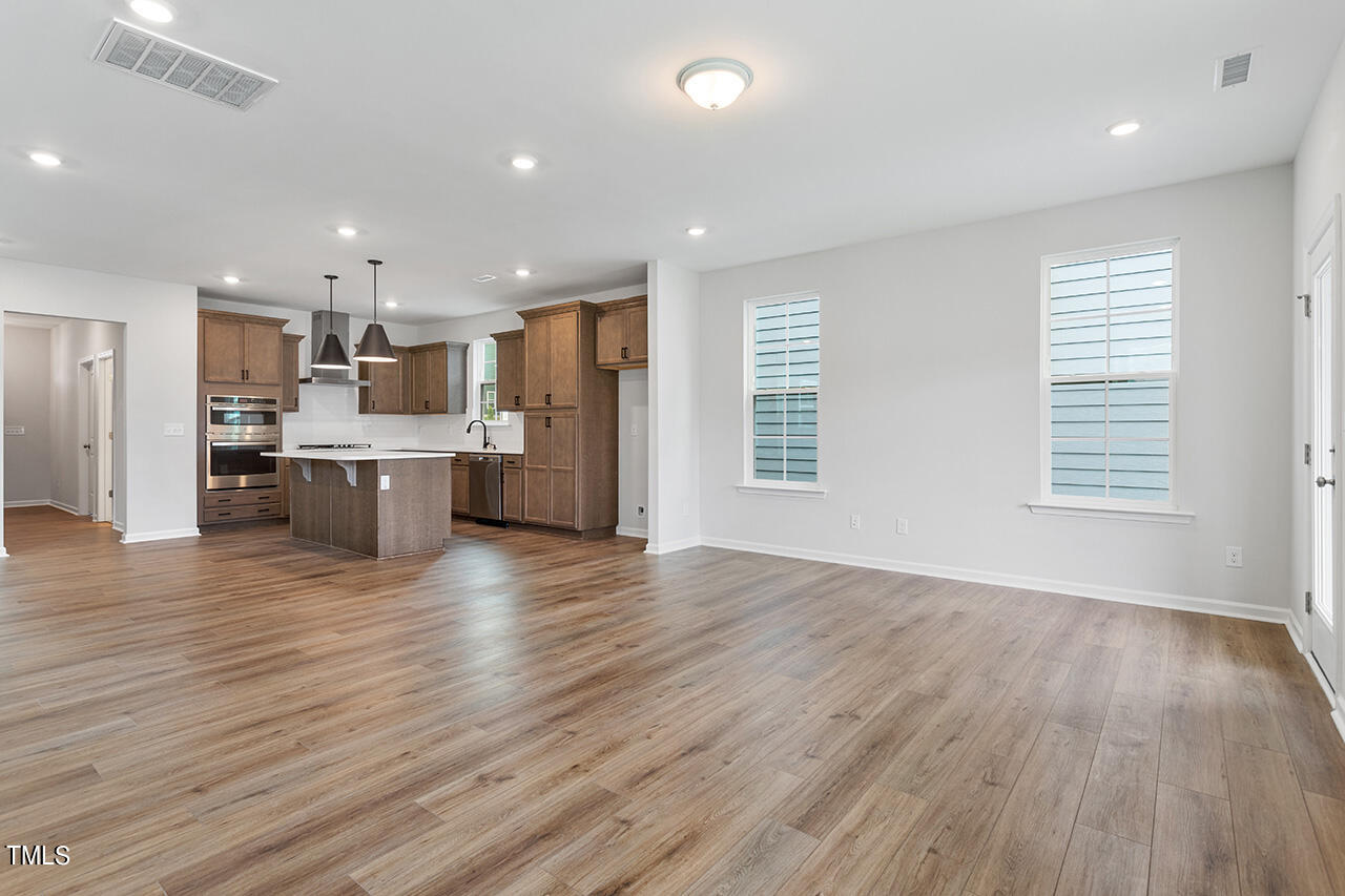 113 Savannah Moss Way Raleigh, NC 27603 - Photo 12 of 22 Kitchen/Great Room