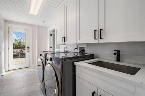 a view of a kitchen with appliances and cabinets