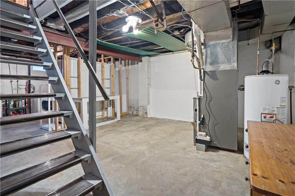146 Stewart Avenue Rochester, PA 15074 - Photo 22 of 25 a view of an empty room with stairs