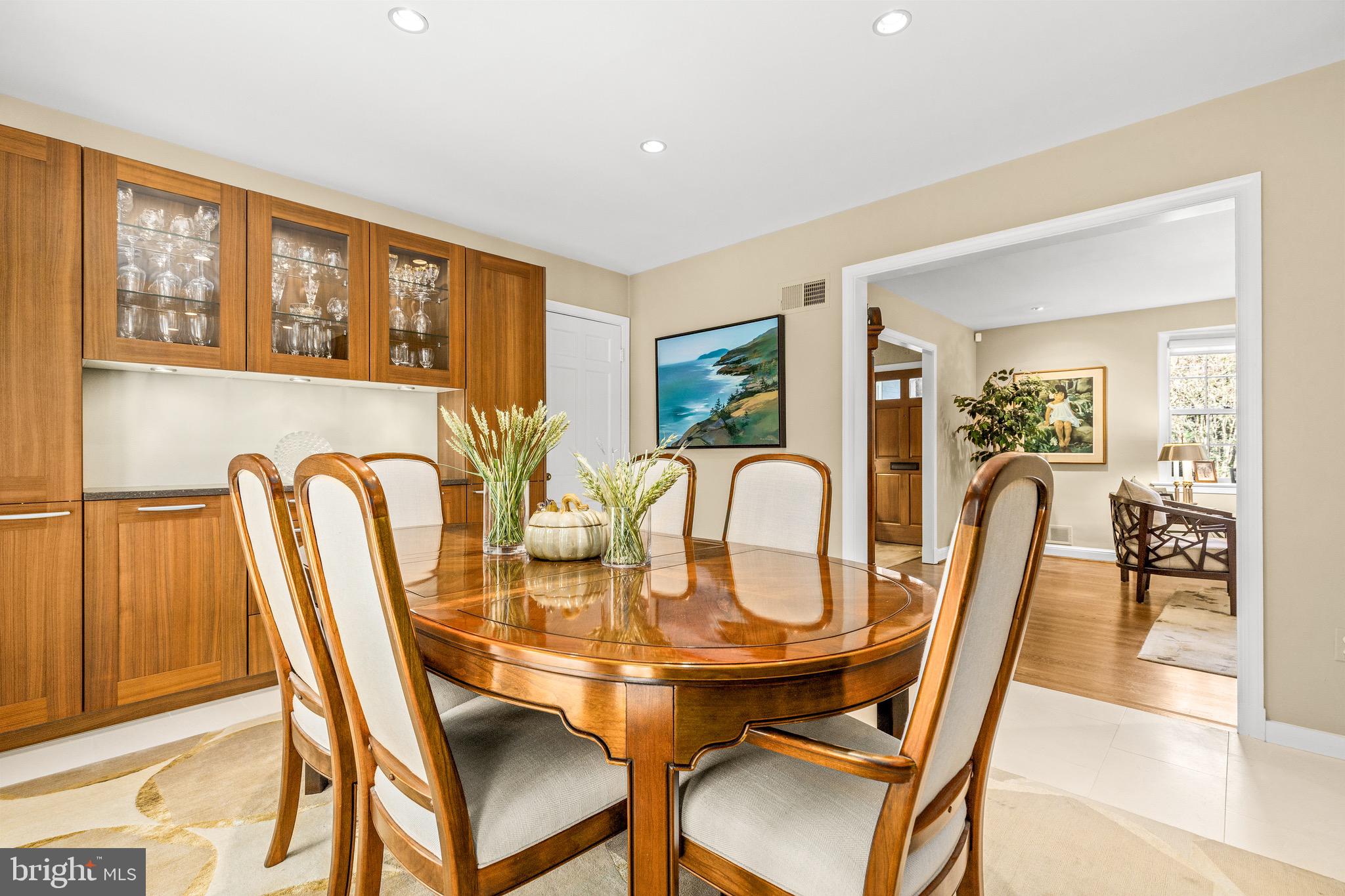4225 50th Street Northwest Washington, DC 20016 - Photo 12 of 30 a dining room with furniture a window and wooden floor