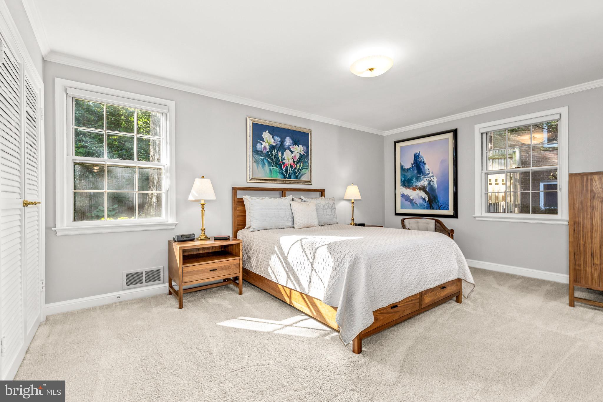 4225 50th Street Northwest Washington, DC 20016 - Photo 13 of 30 a bedroom with a bed and a window with outer view