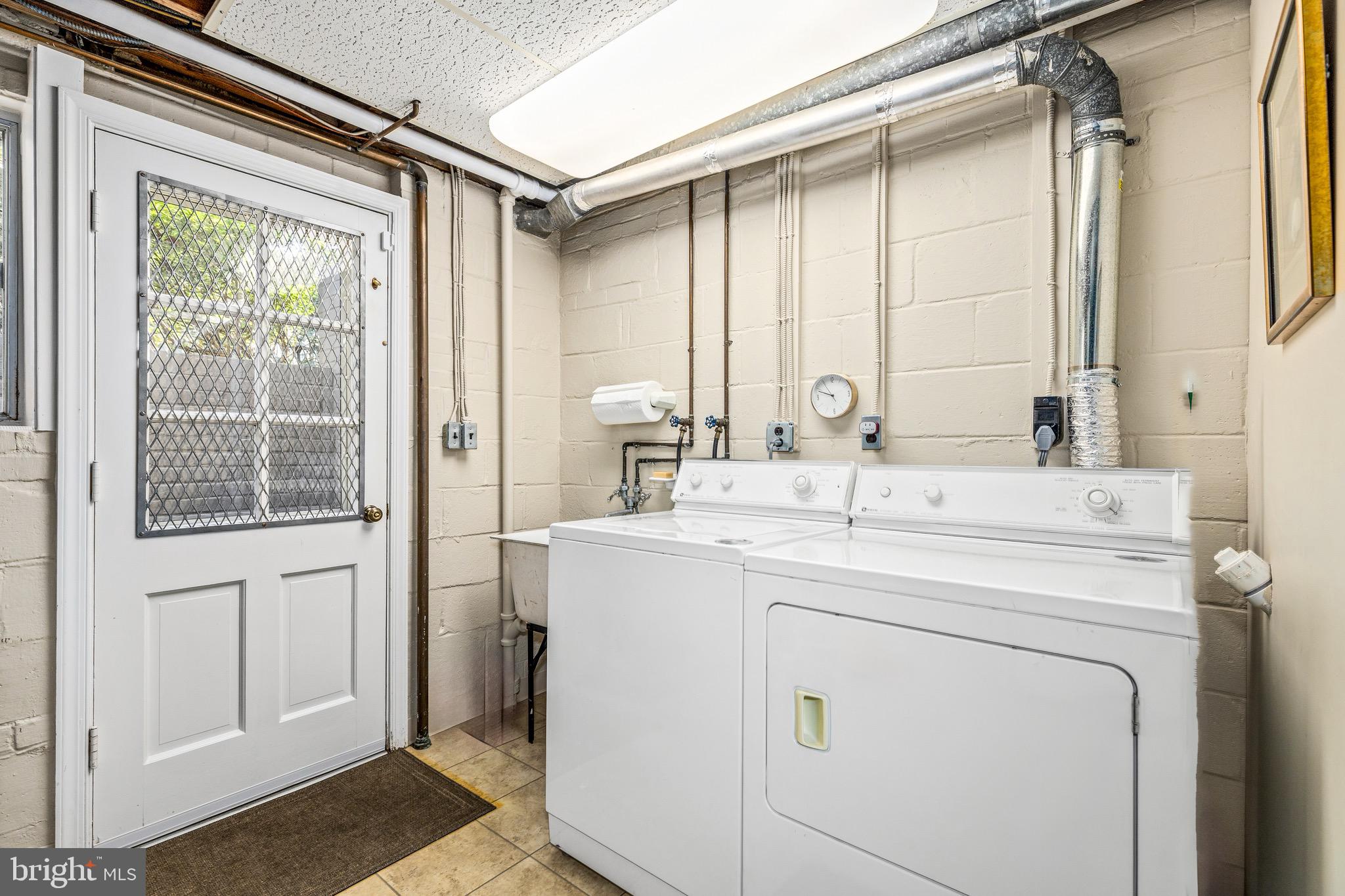 4225 50th Street Northwest Washington, DC 20016 - Photo 23 of 30 a bathroom with a sink and a mirror