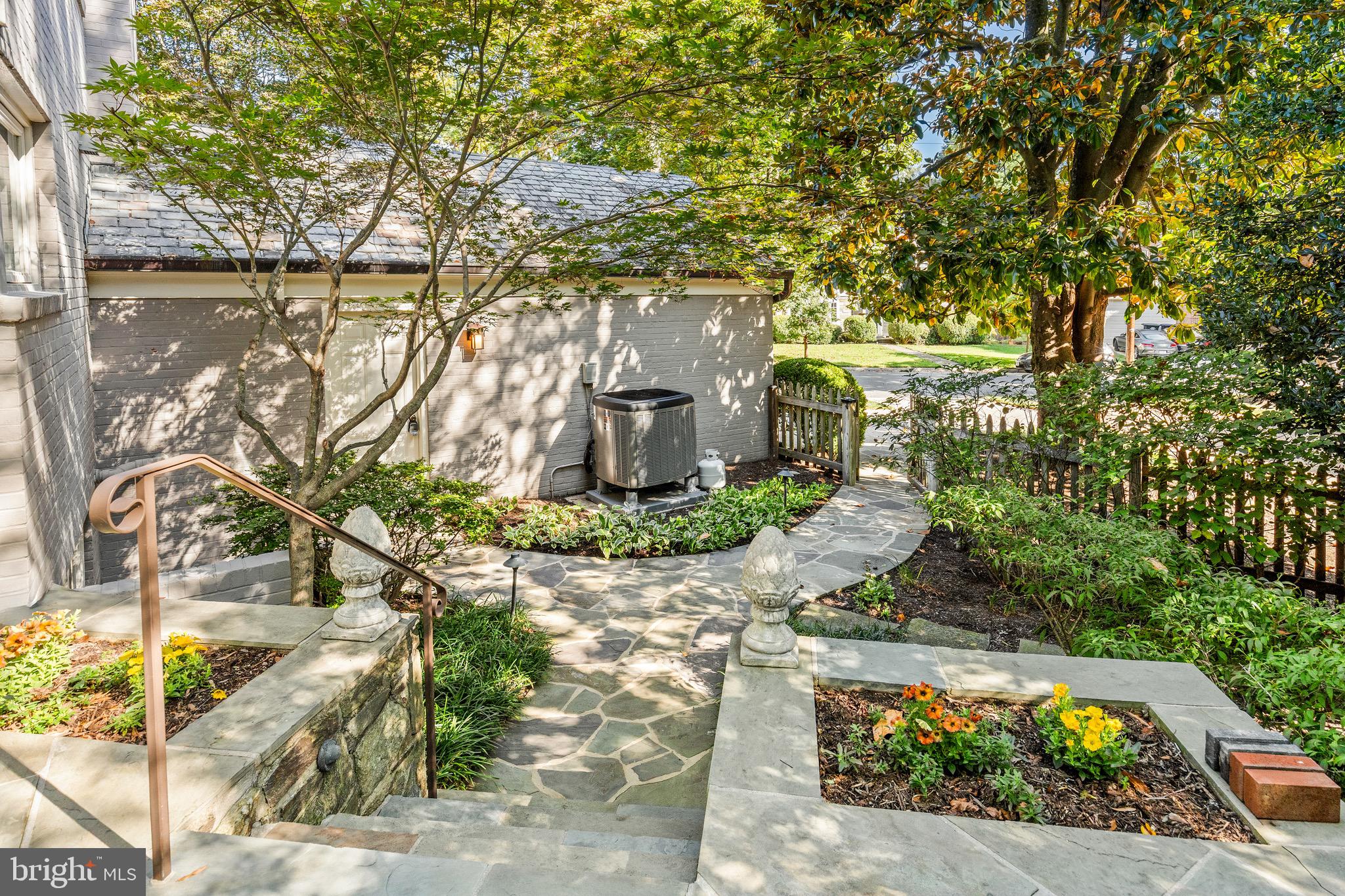 4225 50th Street Northwest Washington, DC 20016 - Photo 28 of 30 front view of a house with a yard