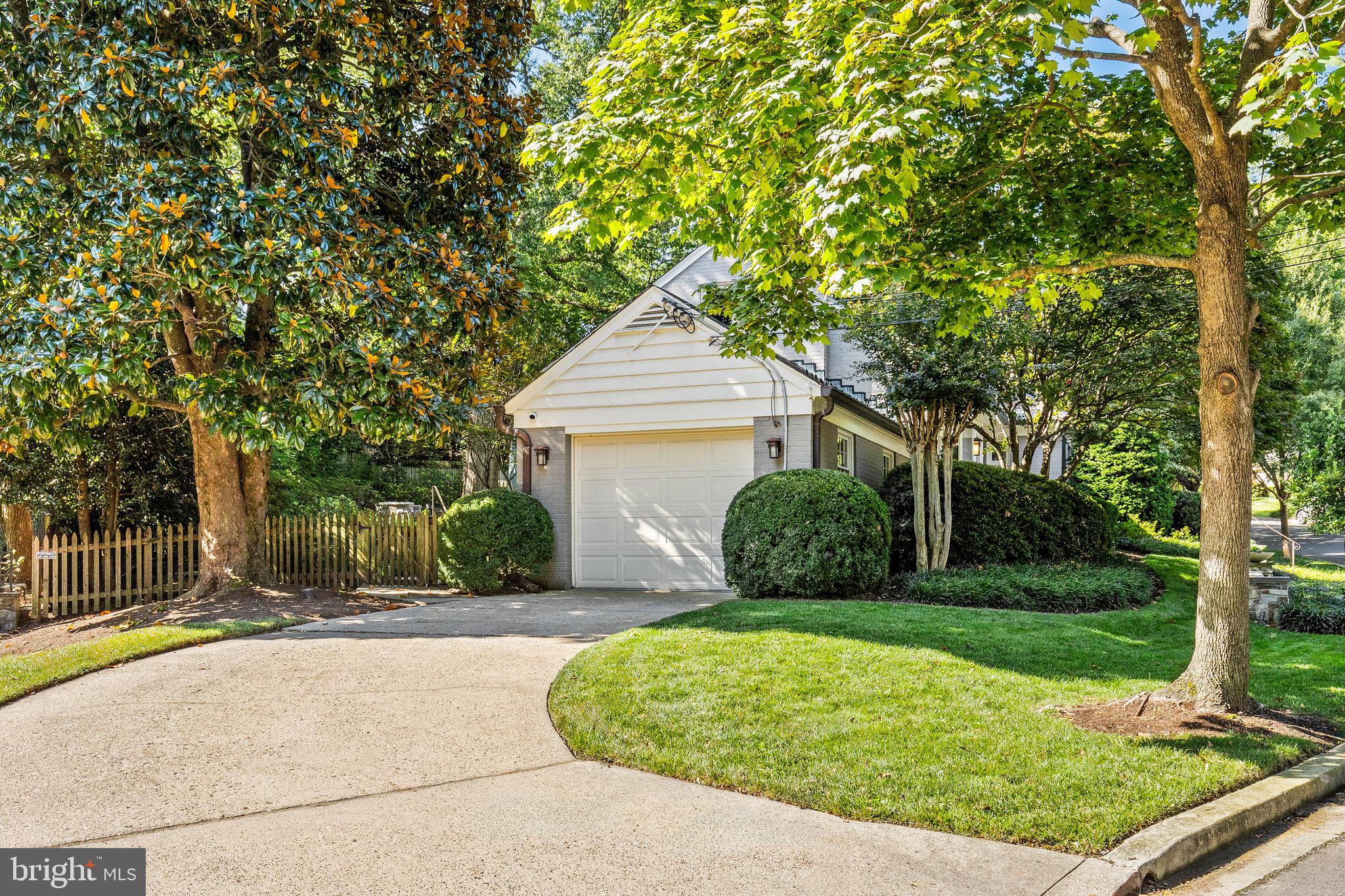 4225 50th Street Northwest Washington, DC 20016 - Photo 29 of 30 a front view of a house with a yard