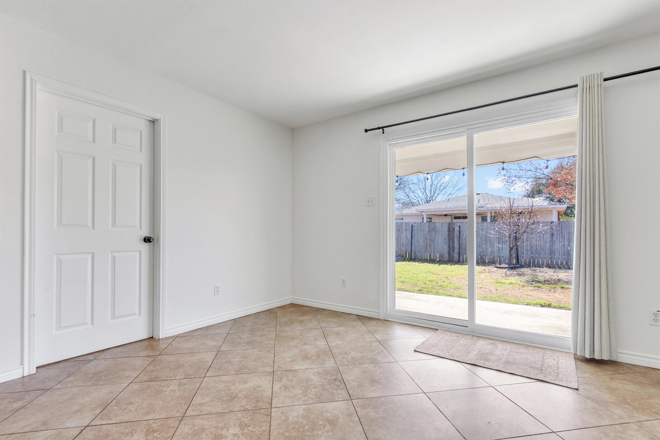 100 Madisons Way Buda, TX 78610 - Photo 13 of 30 Empty room featuring light tile patterned floors