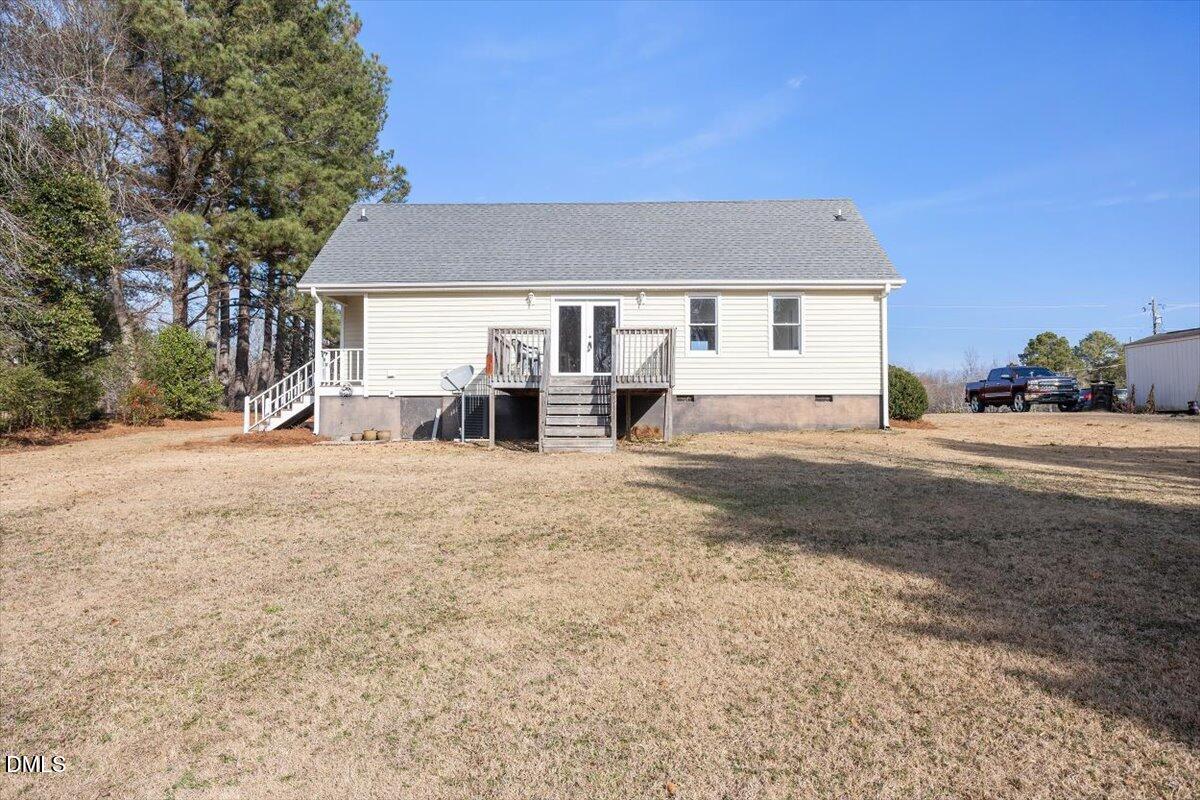 1334 Langdon Road Angier, NC 27501 - Photo 11 of 36 a view of a house with a yard