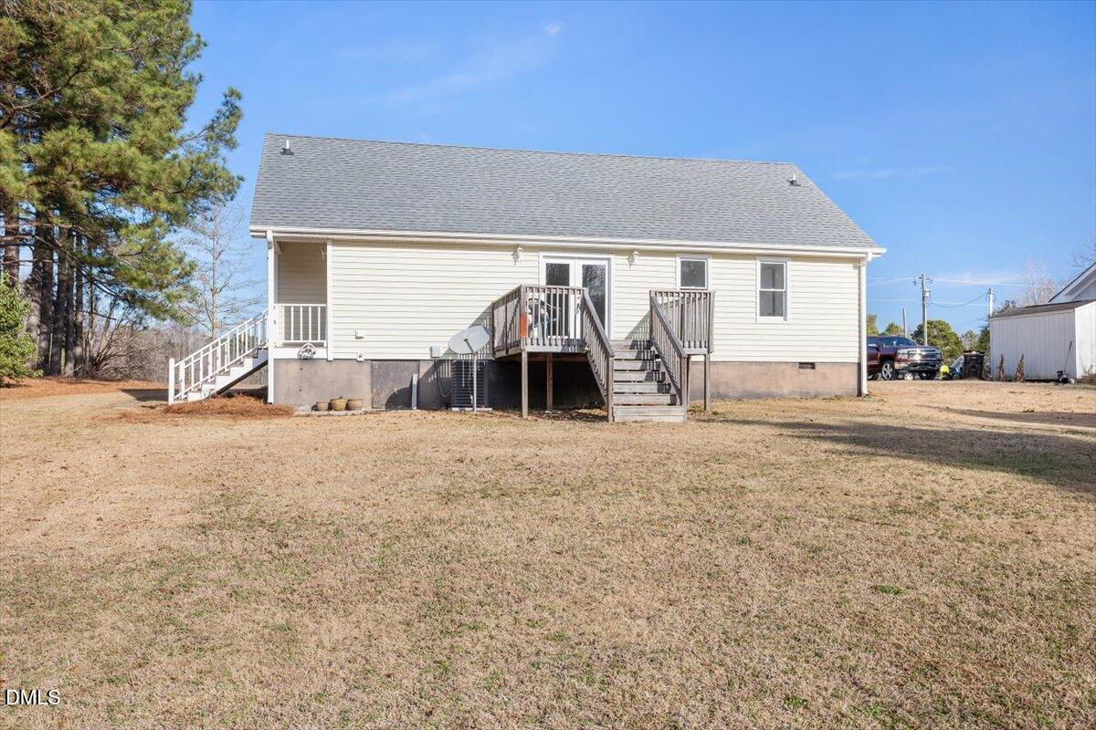 1334 Langdon Road Angier, NC 27501 - Photo 12 of 36 a house view with a outdoor space
