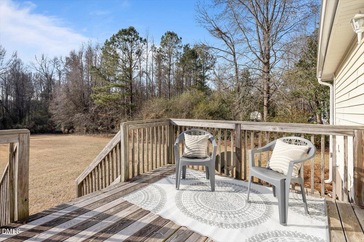 1334 Langdon Road Angier, NC 27501 - Photo 13 of 36 a view of a chairs and table in the balcony