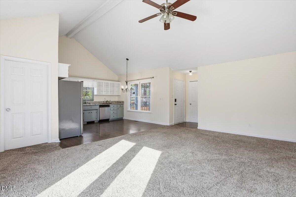 1334 Langdon Road Angier, NC 27501 - Photo 18 of 36 an empty room with a kitchen