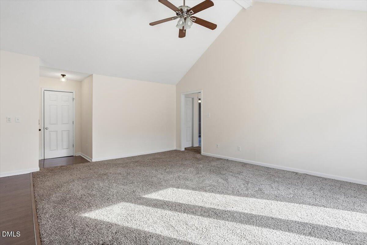 1334 Langdon Road Angier, NC 27501 - Photo 19 of 36 a view of a livingroom with a ceiling fan and window