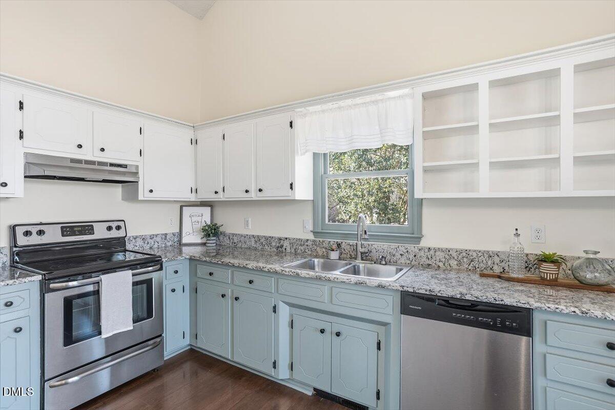 1334 Langdon Road Angier, NC 27501 - Photo 22 of 36 a kitchen with appliances cabinets and a sink