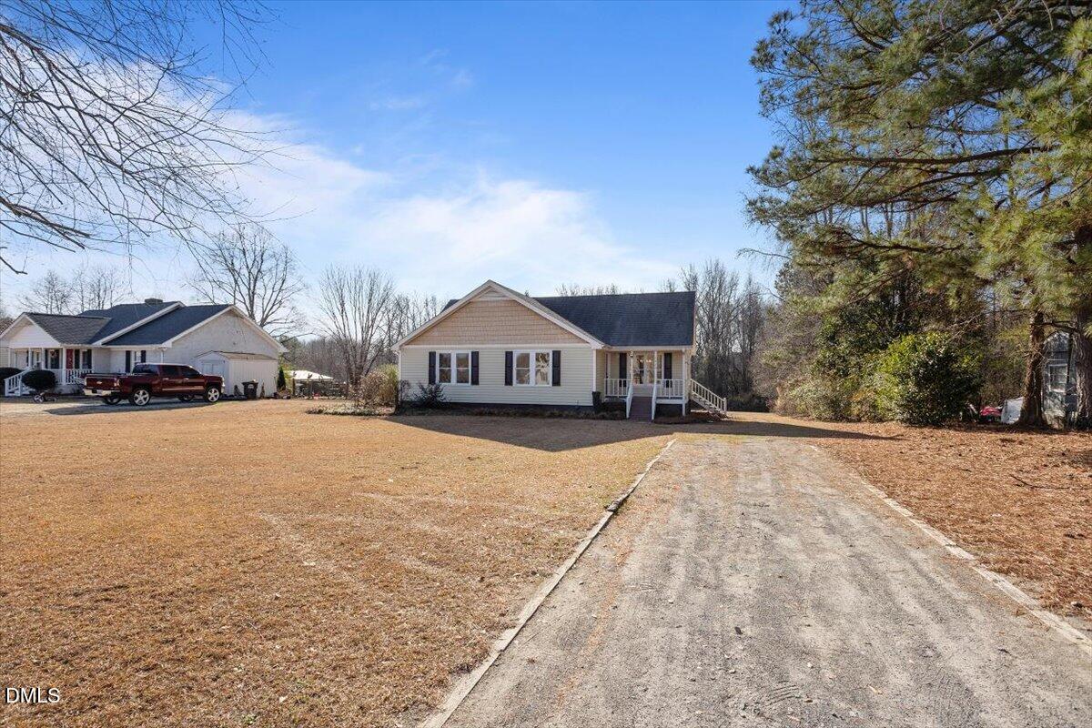 1334 Langdon Road Angier, NC 27501 - Photo 2 of 36 a view of street with parked cars