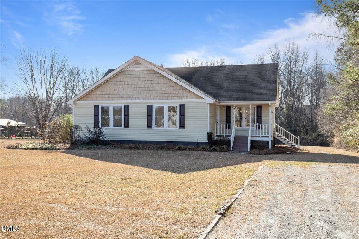 1334 Langdon Road Angier, NC 27501 - Photo 3 of 36 a view of a house with snow on the ground