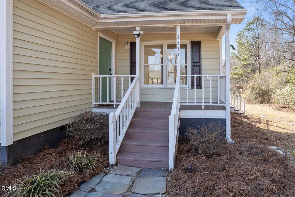 1334 Langdon Road Angier, NC 27501 - Photo 6 of 36 a view of a entrance with stairs and wooden floor