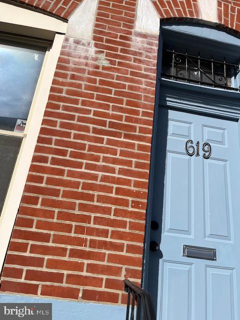 619 Fitzgerald Street Philadelphia, PA 19148 - Photo 1 of 14 a view of a building with wooden door
