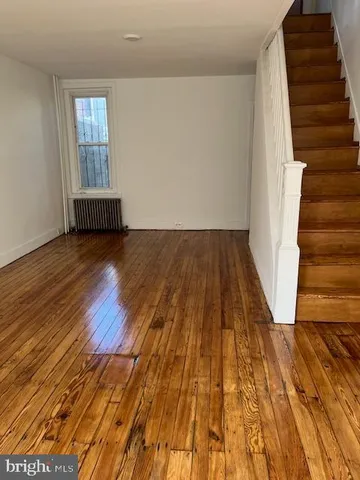wooden floor in a hall with wooden floor