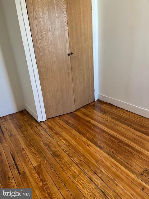 619 Fitzgerald Street Philadelphia, PA 19148 - Photo 8 of 14 a view of a room with wooden floor and white walls