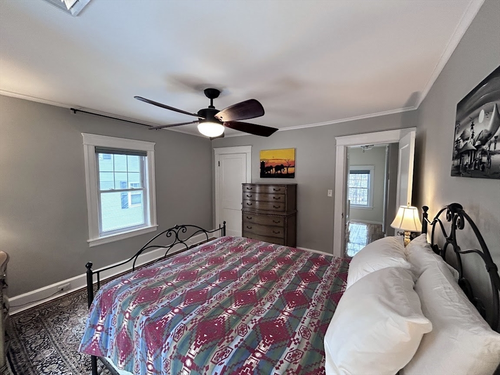 17 Longfellow Road Worcester, MA 01602 - Photo 14 of 19 a bedroom with a large bed and a window