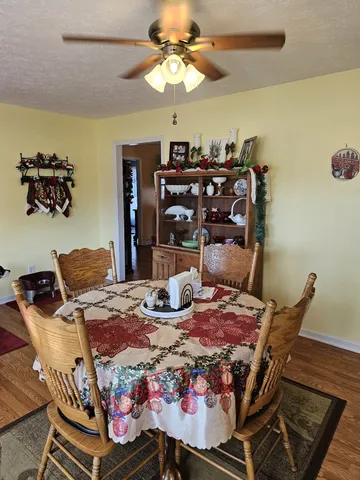 a view of a dining room with furniture