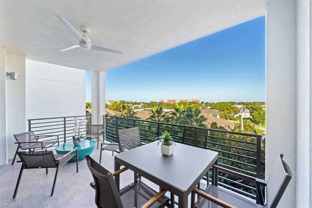 1115 Central Avenue, Unit 445 Naples, FL 34102 - Photo 1 of 20 a view of an outdoor seating area