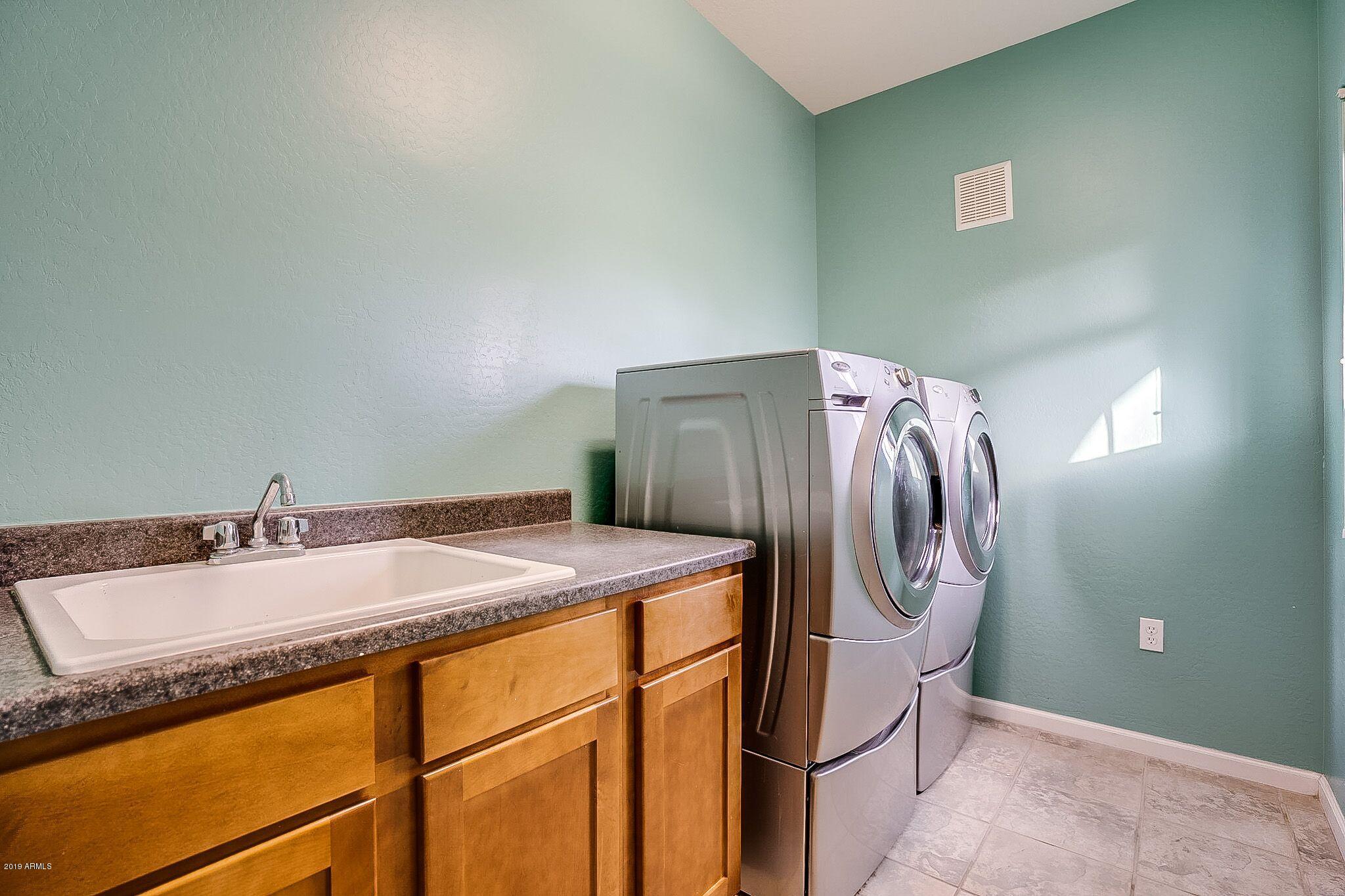 3935 East Rough Rider Road, Unit 1075 Phoenix, AZ 85050 - Photo 17 of 31 Laundry