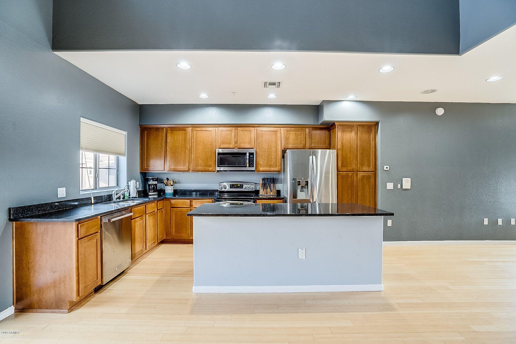 3935 East Rough Rider Road, Unit 1075 Phoenix, AZ 85050 - Photo 3 of 31 RR kitchen 7