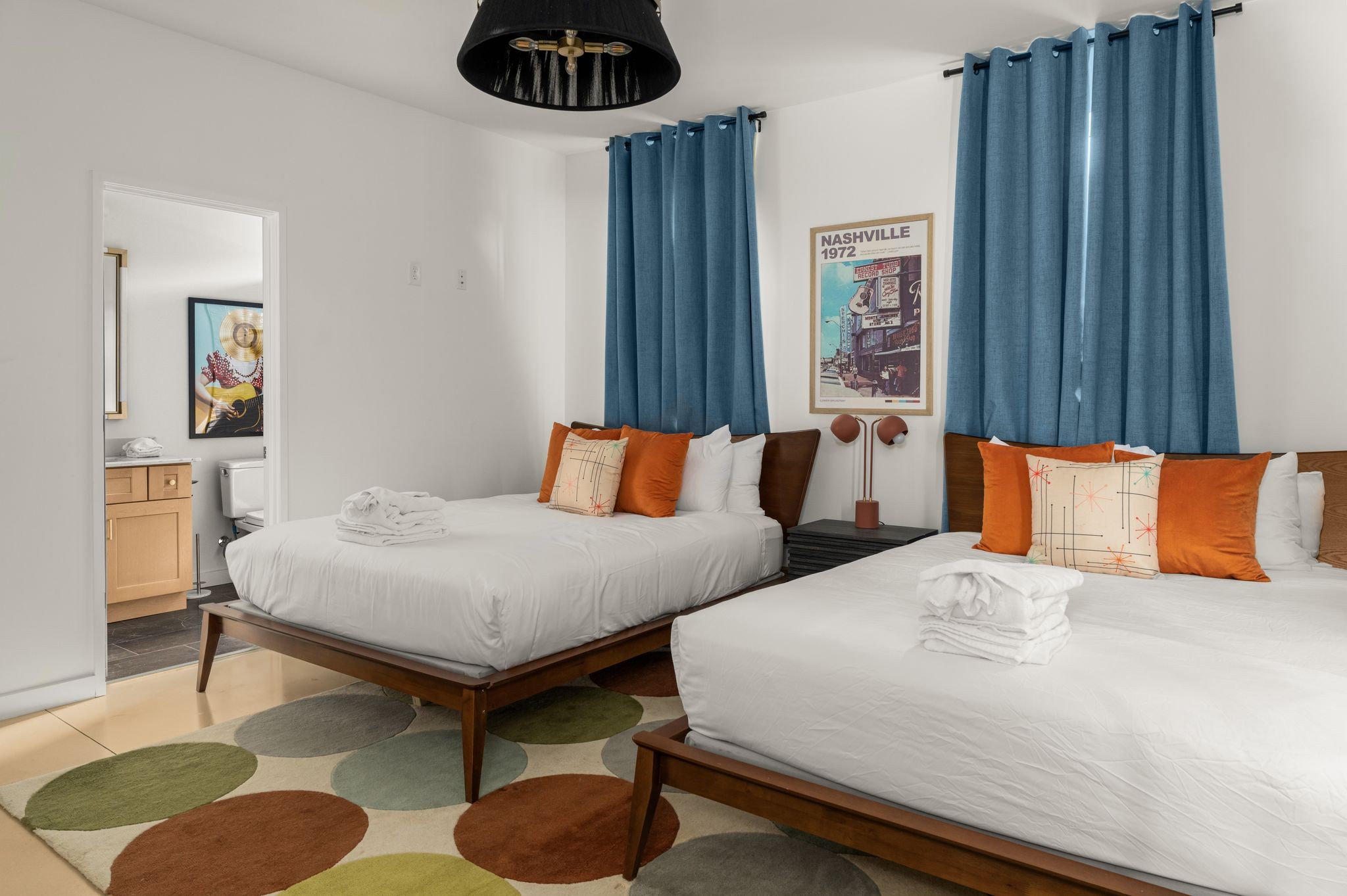 2000 South Hamilton Road, Unit 17 Nashville, TN 37218 - Photo 12 of 40 a bedroom with bed and a chandelier