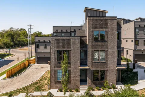 a view of a buildings in the background