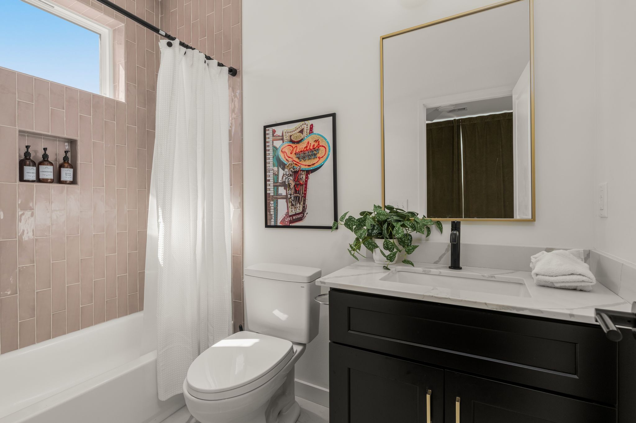 2000 South Hamilton Road, Unit 17 Nashville, TN 37218 - Photo 9 of 40 a bathroom with a toilet a sink and a mirror