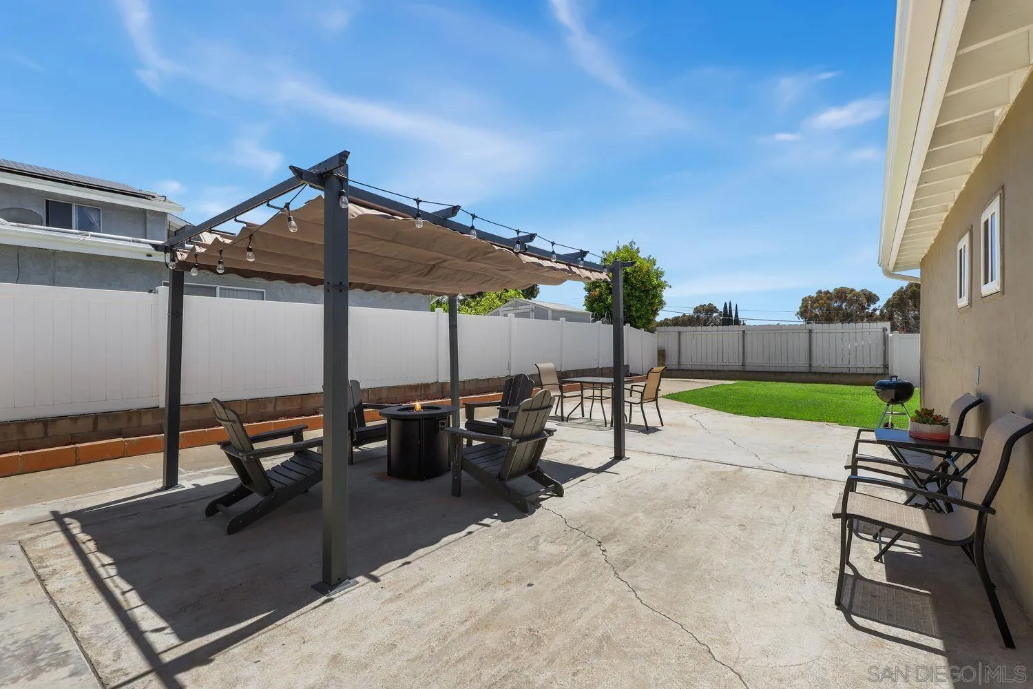 8619 Harness Street Spring Valley, CA 91977 - Photo 18 of 23 a view of a swimming pool with a lounge chair