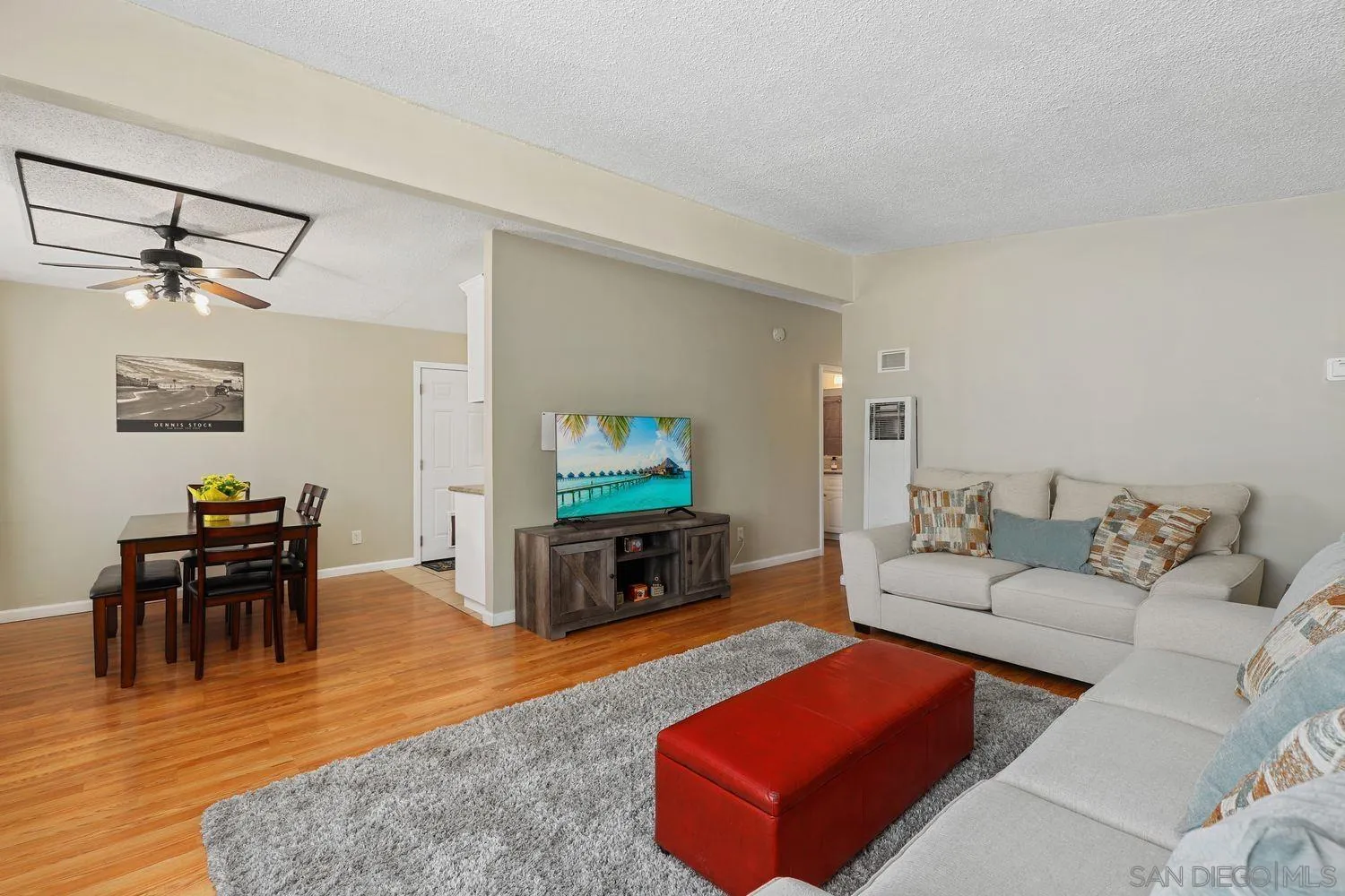 8619 Harness Street Spring Valley, CA 91977 - Photo 4 of 23 a living room with furniture and a flat screen tv