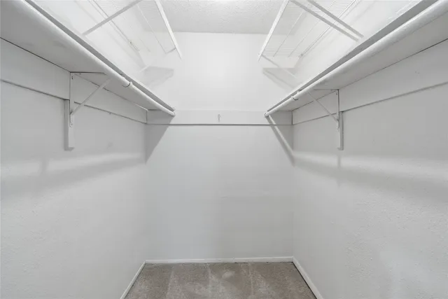 a bathroom with a sink toilet vanity and shower