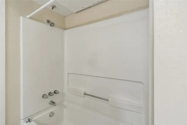 a view of a lake with a building in front of it