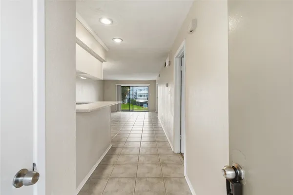 a view of an empty room with window