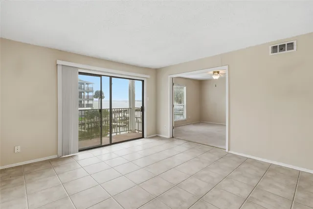 a view of a bathroom with a glass door