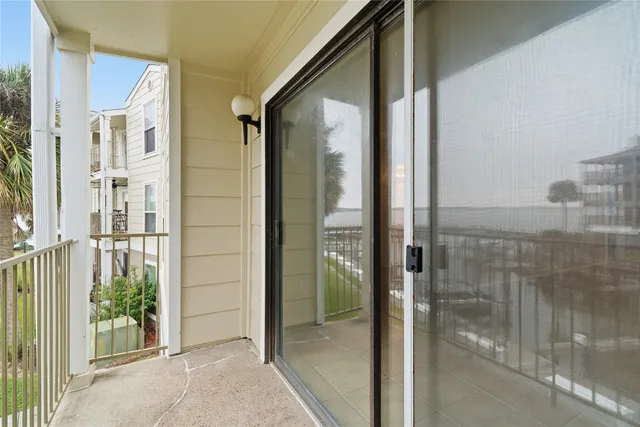 a view of a balcony with lake view