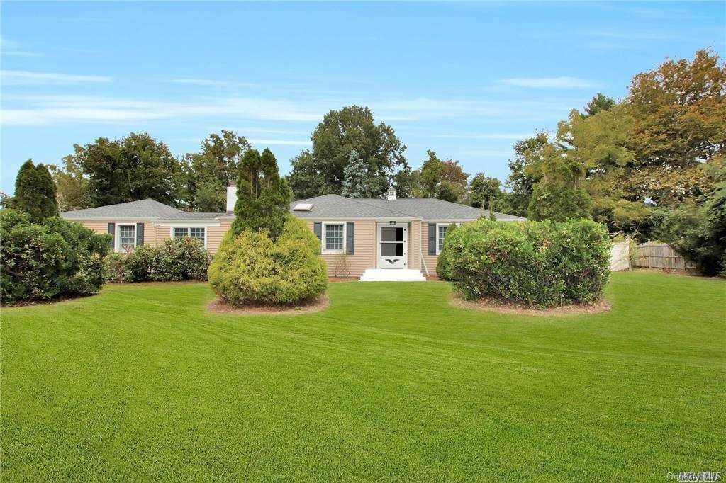 82 Dunlop Road Huntington, NY 11743 - Photo 1 of 1 a view of house with garden