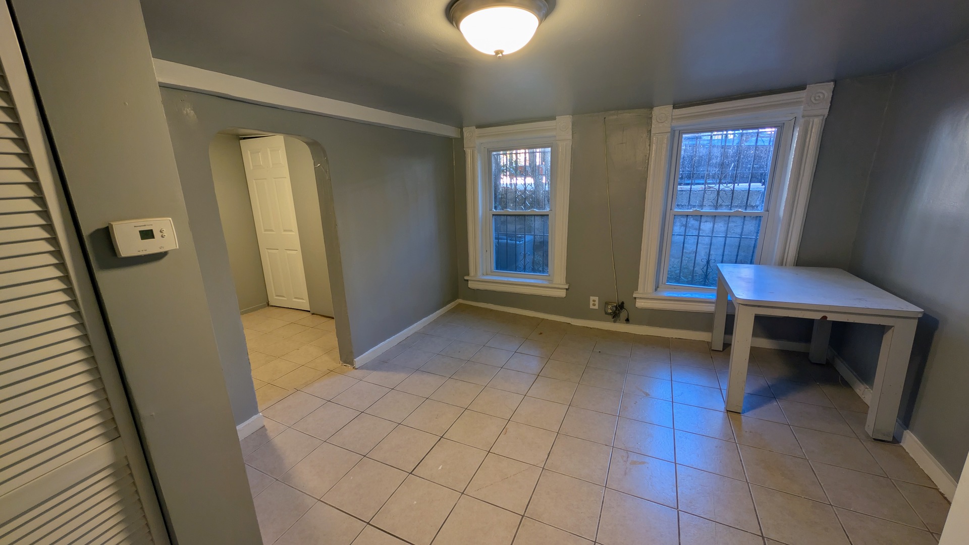 1629 West Beach Avenue, Unit 1F Chicago, IL 60622 - Photo 3 of 7 a view of a livingroom with furniture and windows