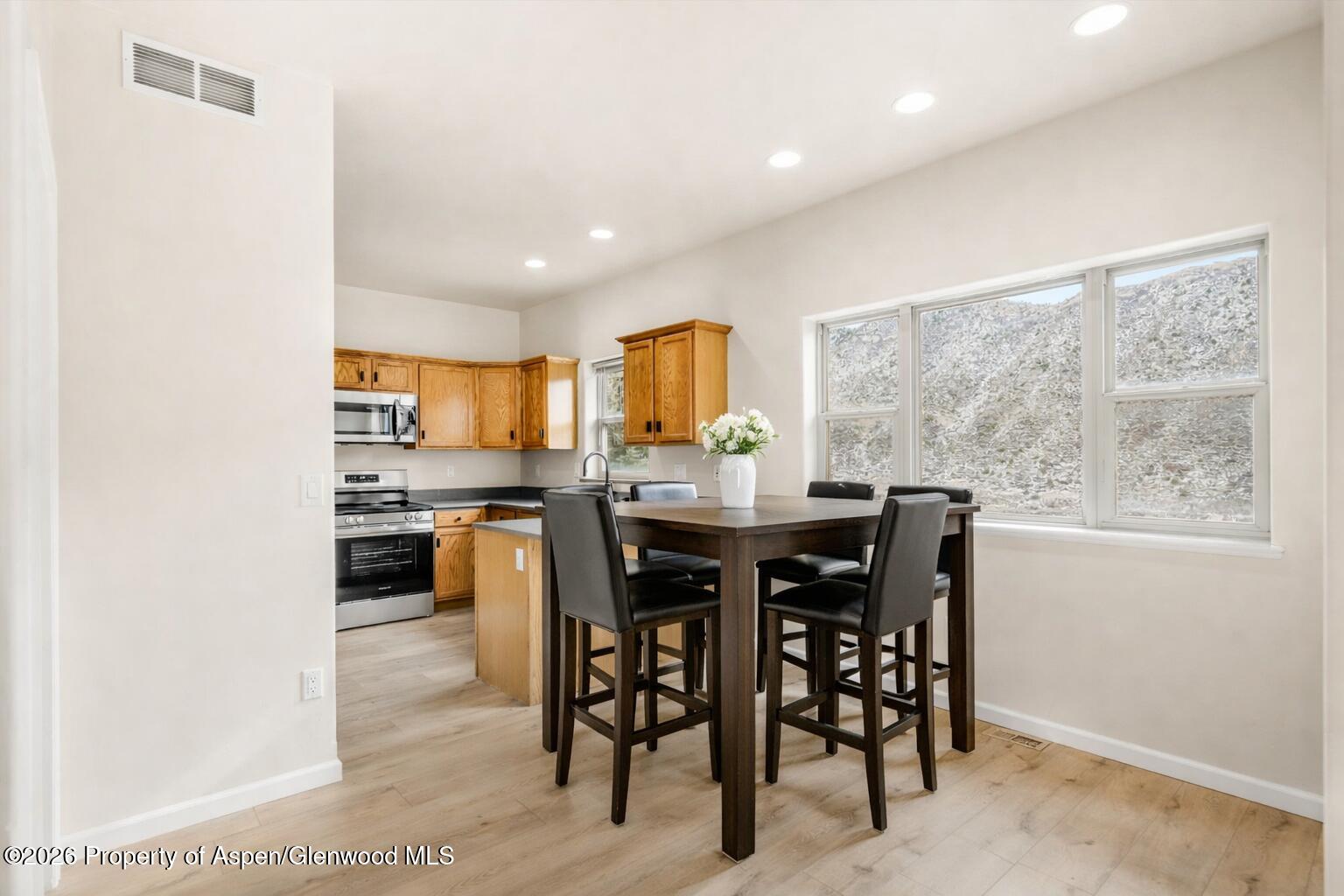 242 Castle Ridge Drive New Castle, CO 81647 - Photo 4 of 25 Virtually Staged Dining Room