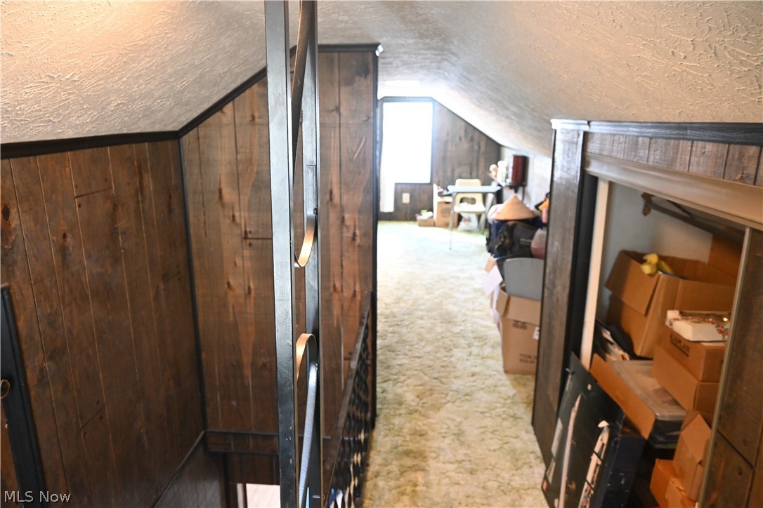 94 North 5th Street Rittman, OH 44270 - Photo 11 of 27 Bonus room with a textured ceiling and light carpet