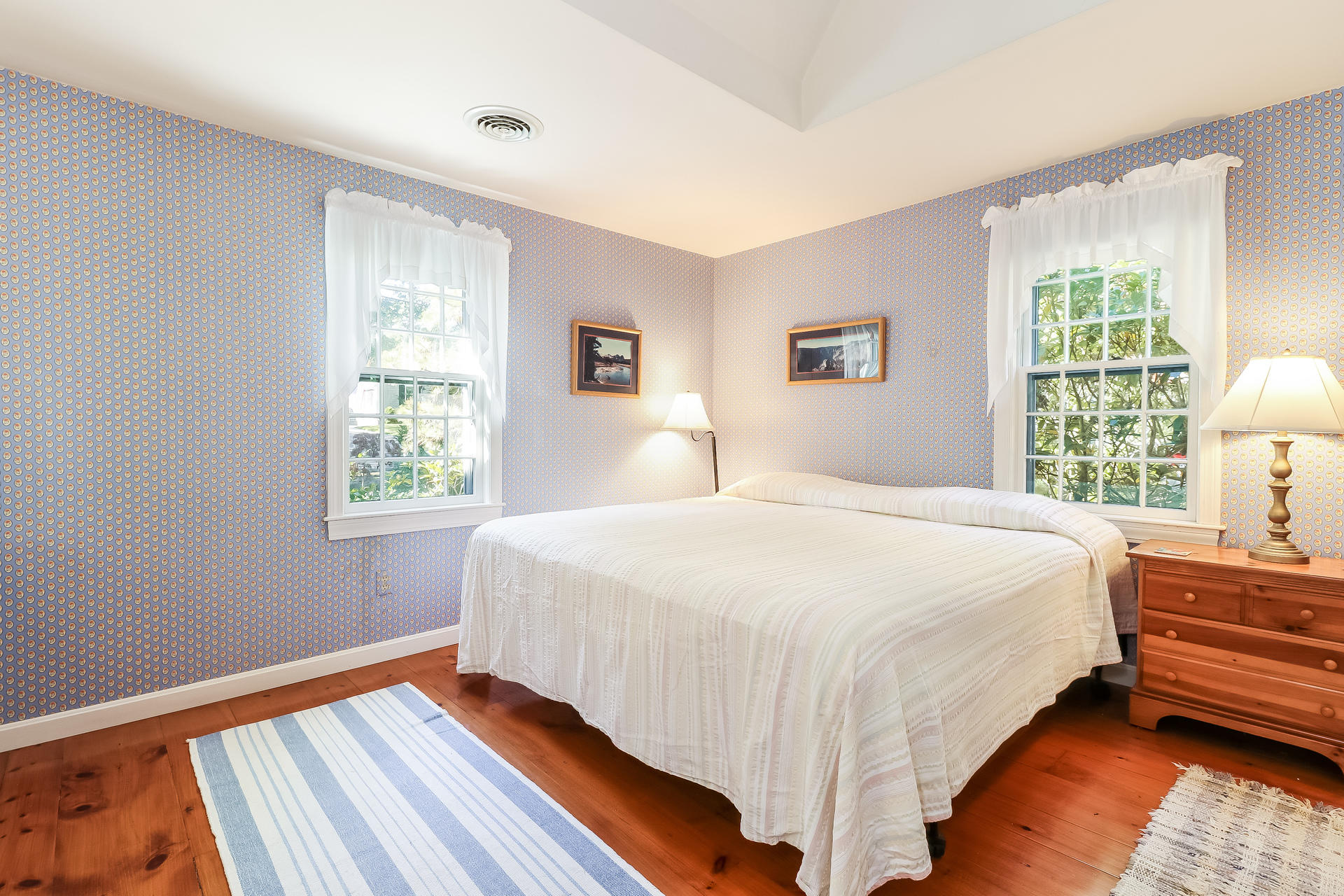 45 Brooks Road Harwich Port, MA 02646 - Photo 13 of 34 a bedroom with a bed and a window