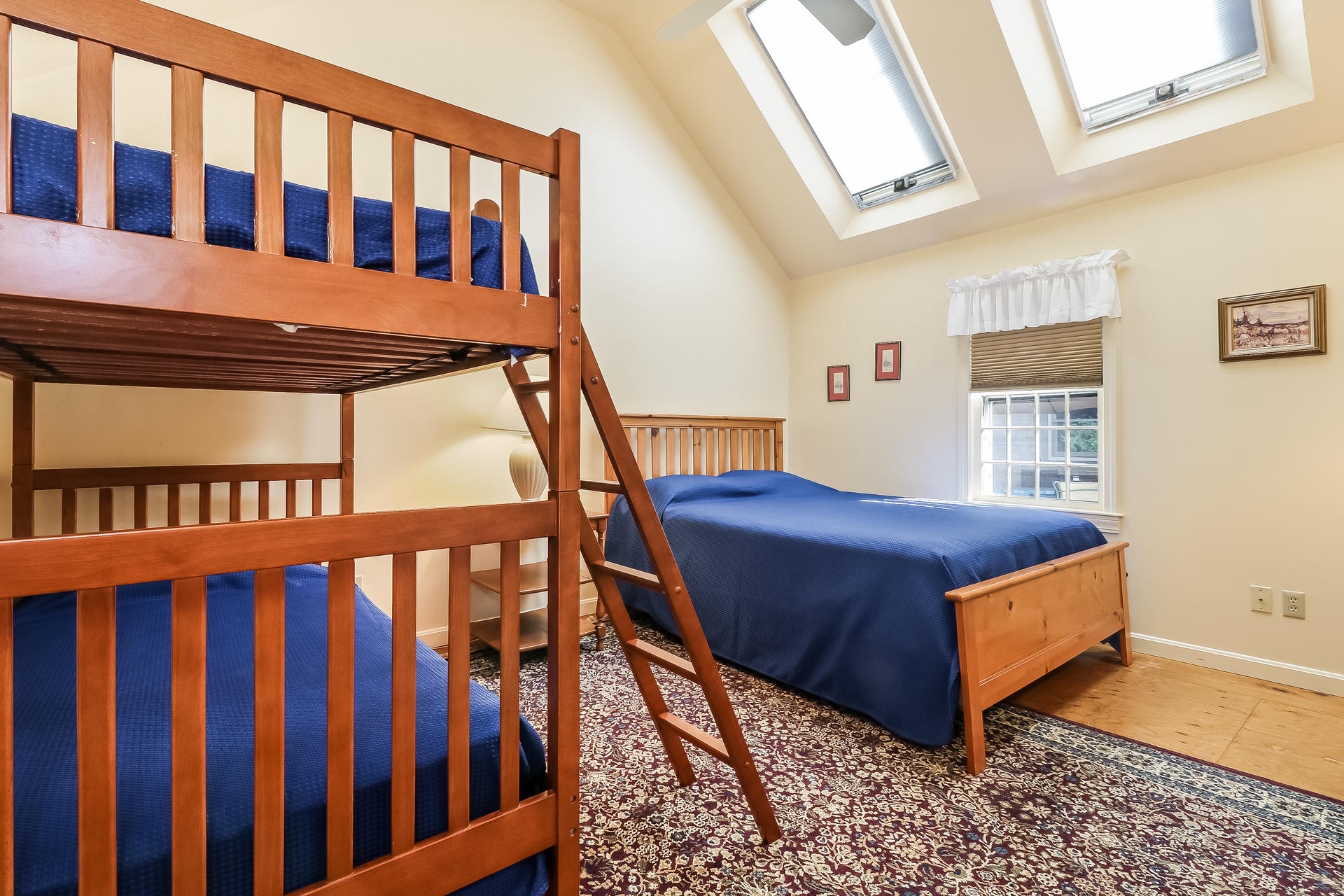 45 Brooks Road Harwich Port, MA 02646 - Photo 17 of 34 a view of a bedroom with furniture and wooden floor