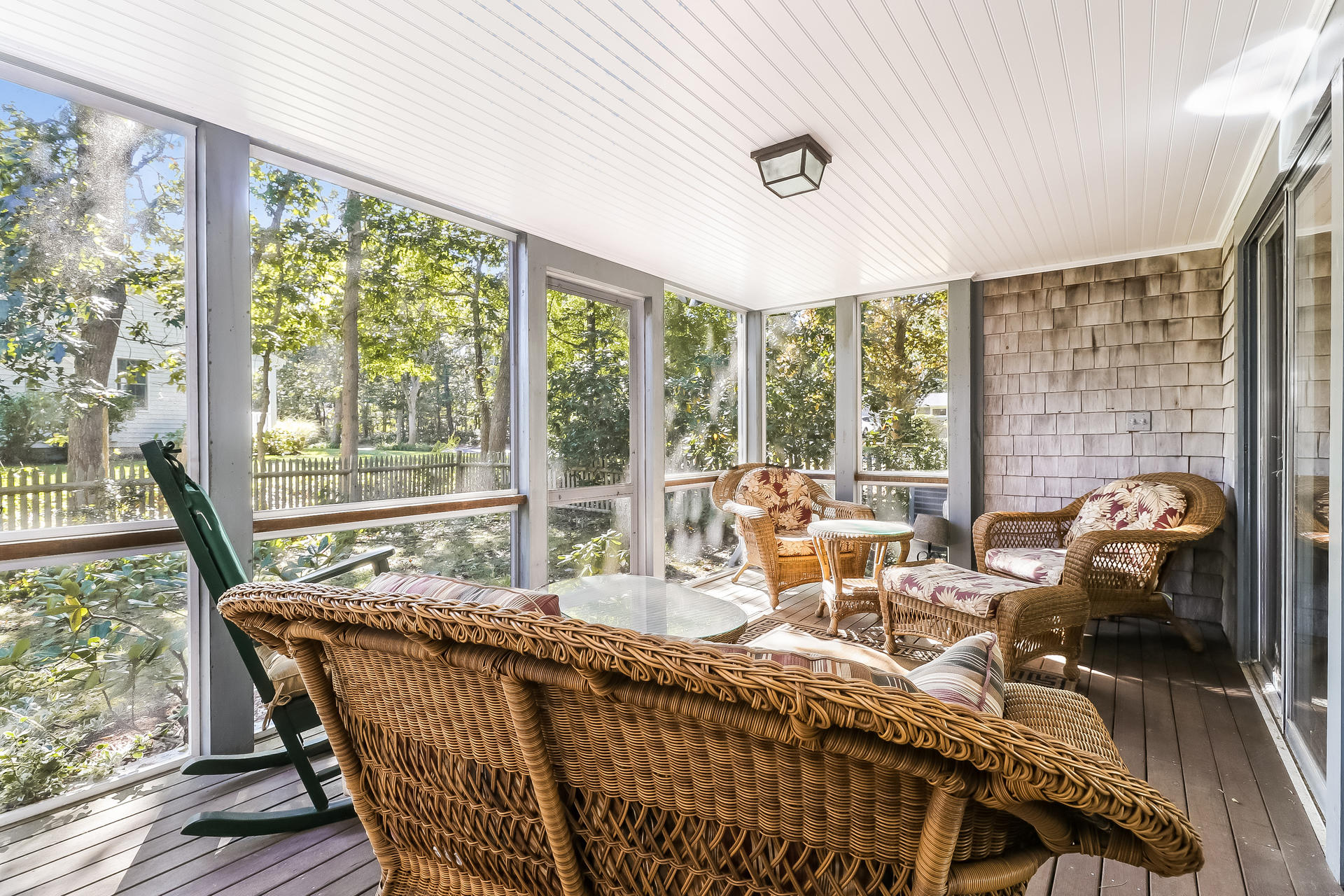 45 Brooks Road Harwich Port, MA 02646 - Photo 25 of 34 a living room with furniture and floor to ceiling windows