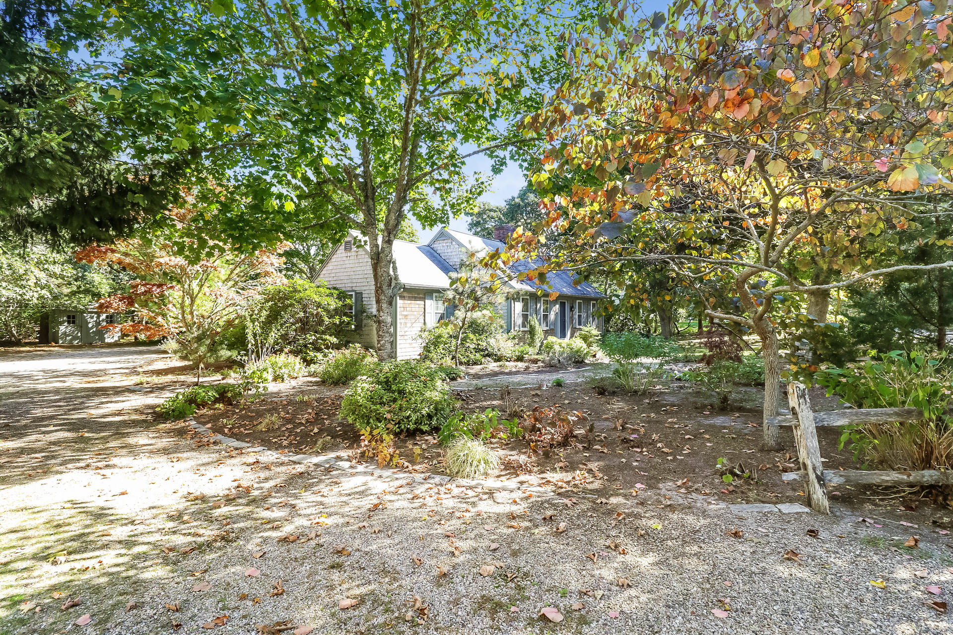 45 Brooks Road Harwich Port, MA 02646 - Photo 29 of 34 a backyard of a house with lots of green space