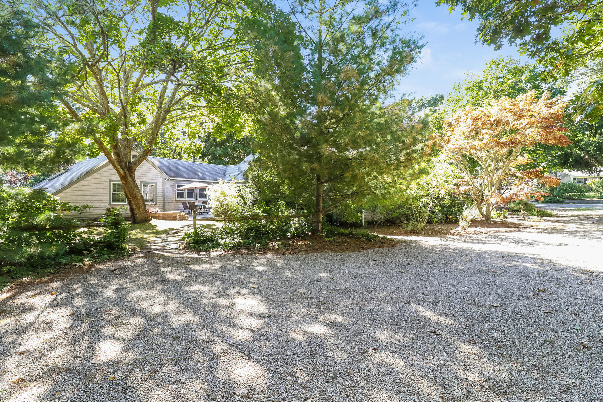 45 Brooks Road Harwich Port, MA 02646 - Photo 30 of 34 a house view with a backyard space