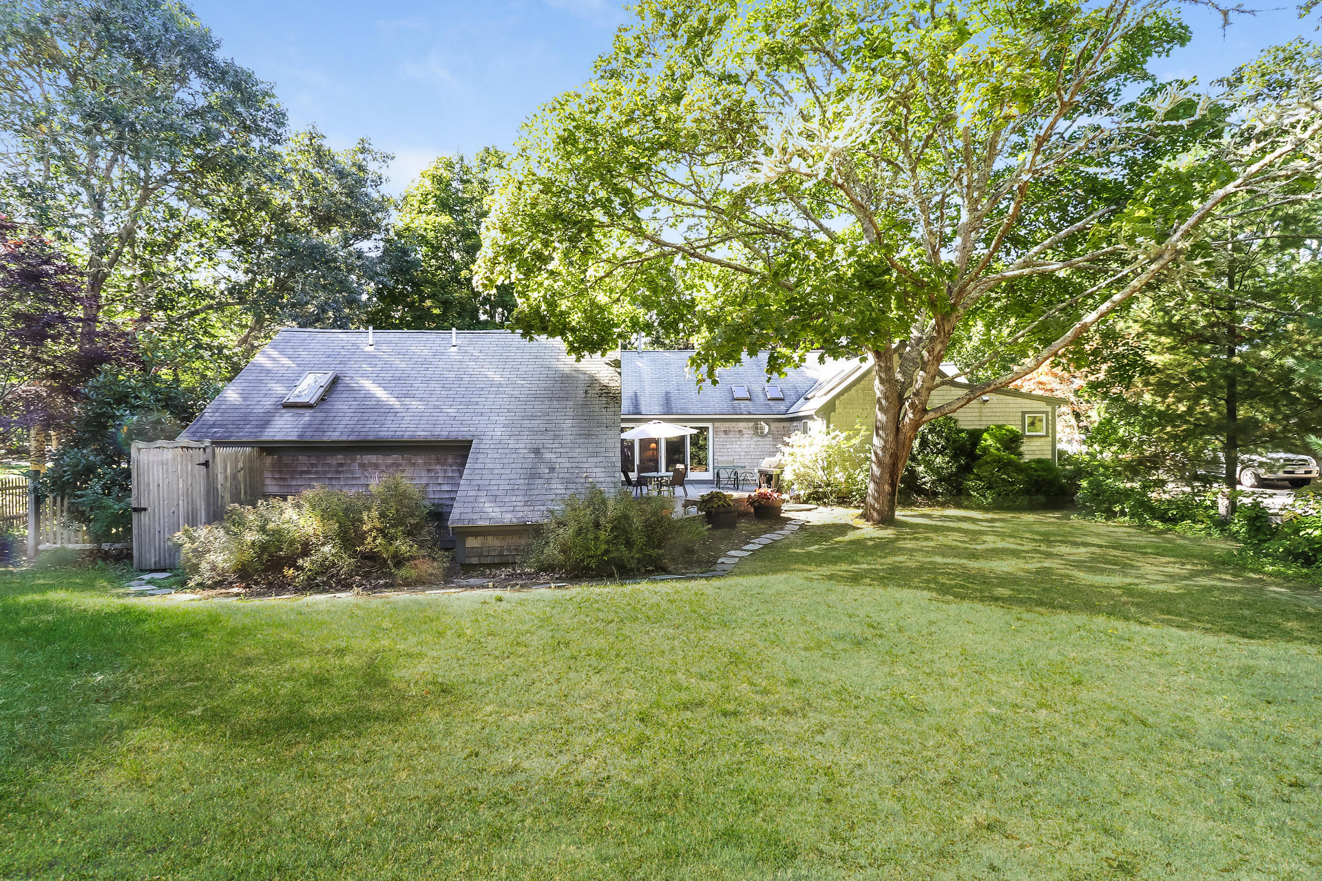 45 Brooks Road Harwich Port, MA 02646 - Photo 31 of 34 a front view of a house with a yard