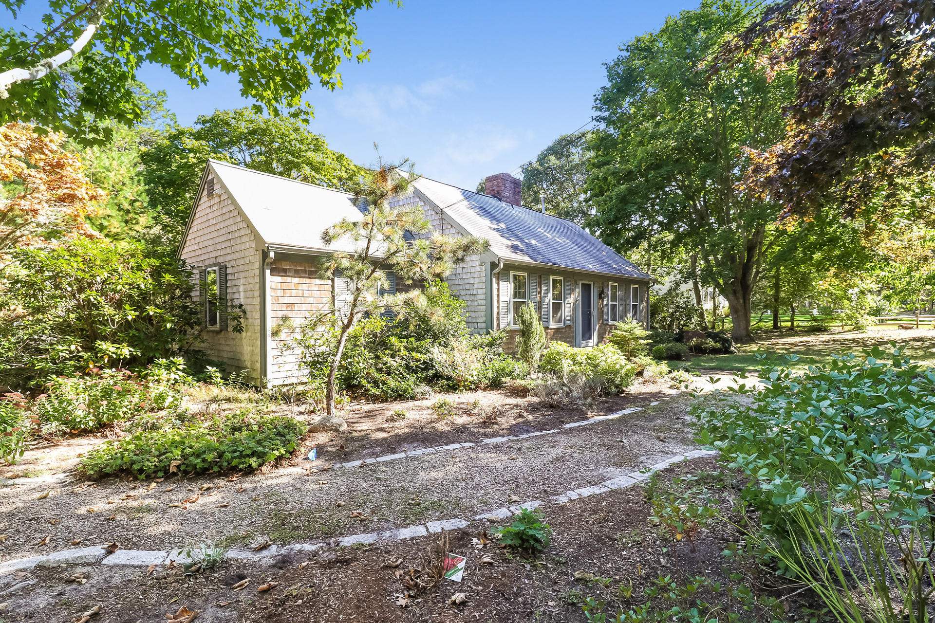 45 Brooks Road Harwich Port, MA 02646 - Photo 5 of 34 a view of a house with yard and a garden