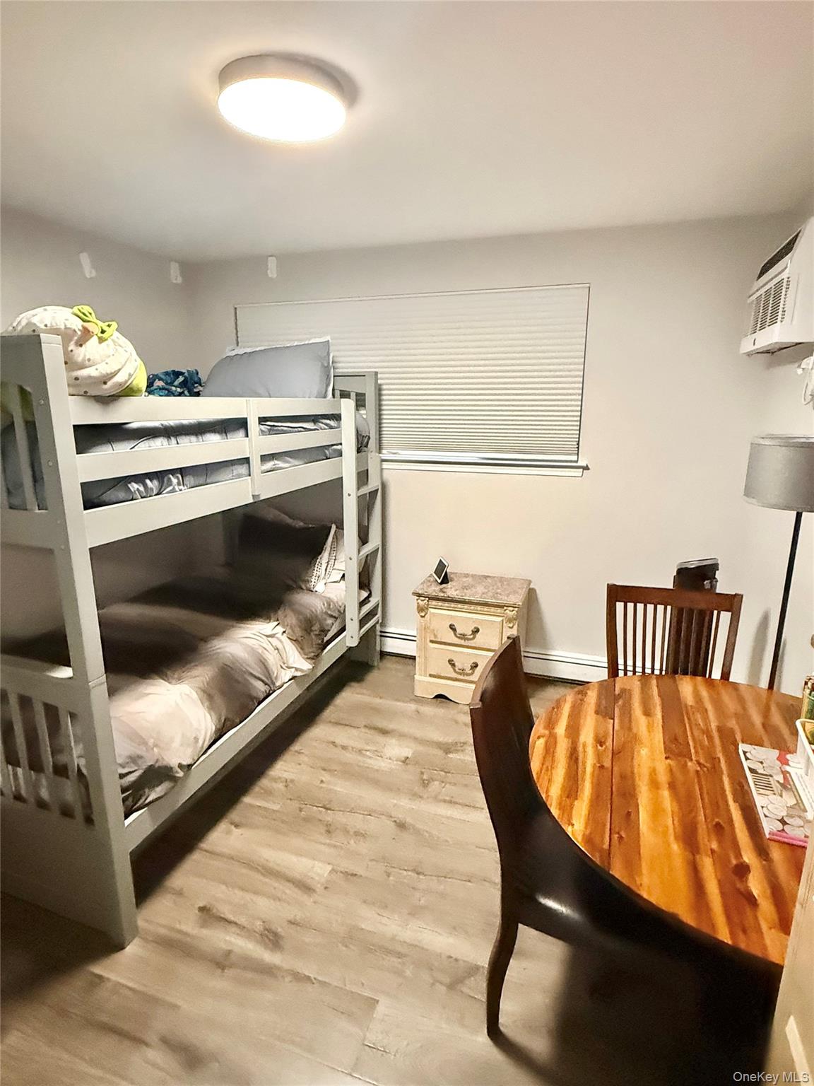 42 Briar Cliff, Unit 4 2 Ossining, NY 10562 - Photo 11 of 22 a living room with furniture and a table